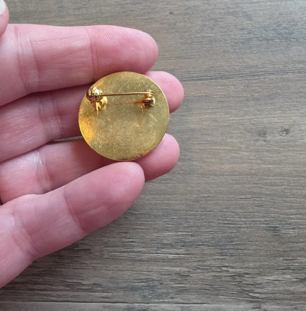 Gold-Tone Brooch with Round Blue Gemstone